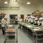 A consulting chef teaches Tasty team members to cut vegetables with as little waste as possible.